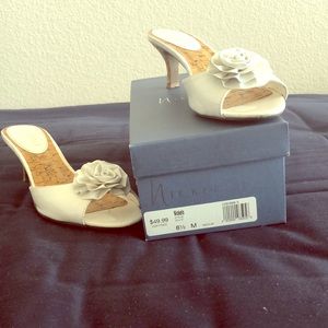 Slip on heels with flier detail.